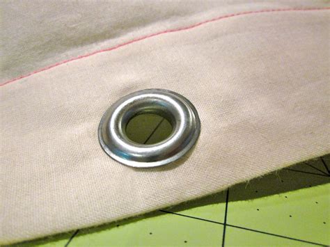 metal hole fabric|applying grommets to fabric.